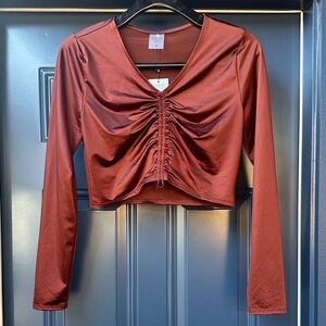 Calia Rust Ruched Crop Top. Long sleeve, shimmer lightweight.